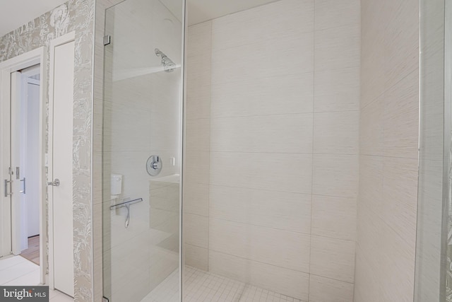 bathroom featuring an enclosed shower