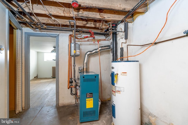 utilities with radiator and water heater