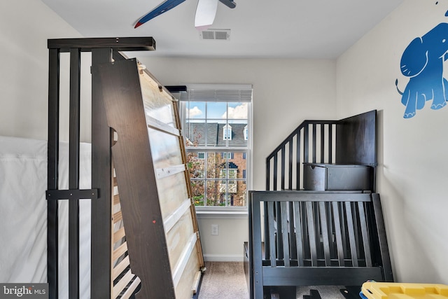 bedroom with carpet floors and ceiling fan