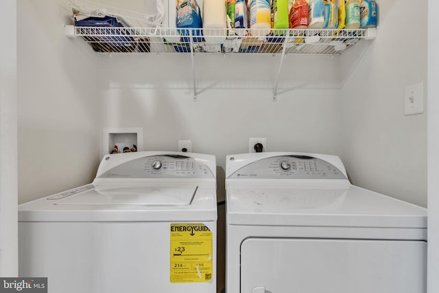 washroom featuring washer and dryer