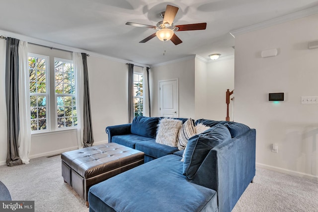 living room with ceiling fan, plenty of natural light, and light carpet