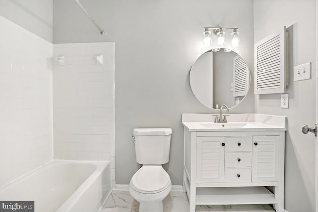 full bathroom featuring toilet, vanity, and tub / shower combination