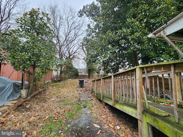 view of yard featuring a wooden deck