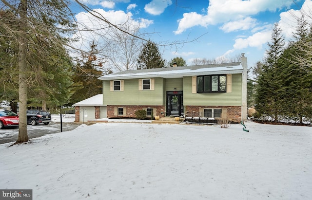 split foyer home featuring a garage