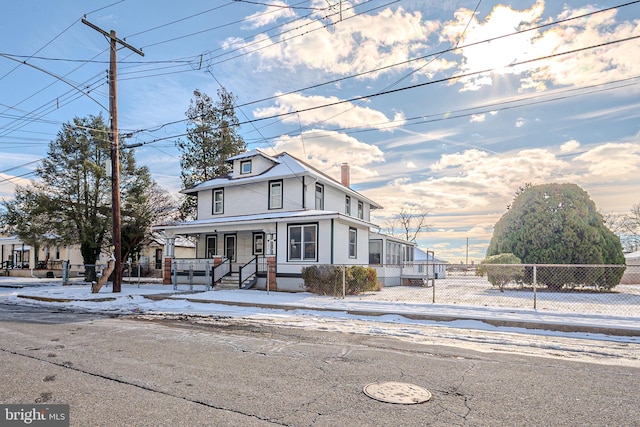 view of property with a porch