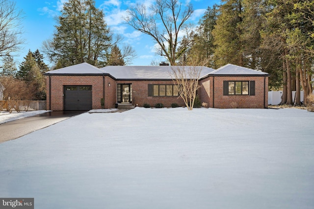 ranch-style home with a garage