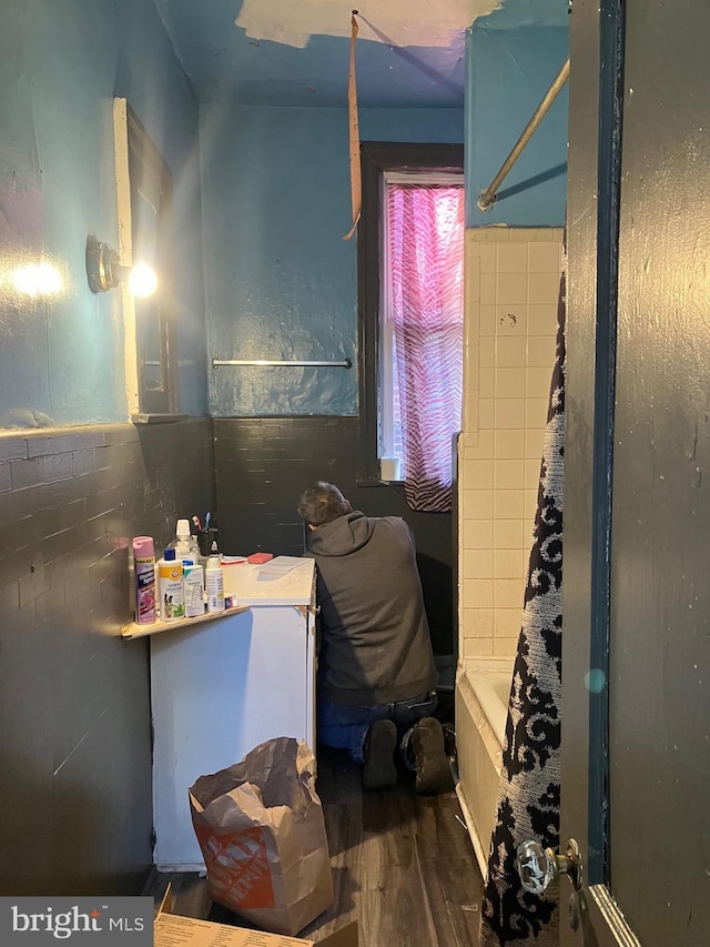 bathroom featuring hardwood / wood-style flooring