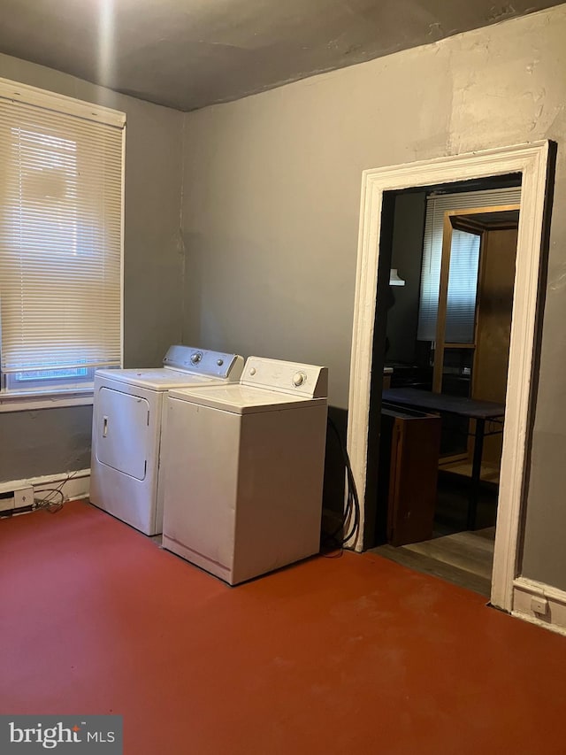 washroom featuring independent washer and dryer and carpet floors