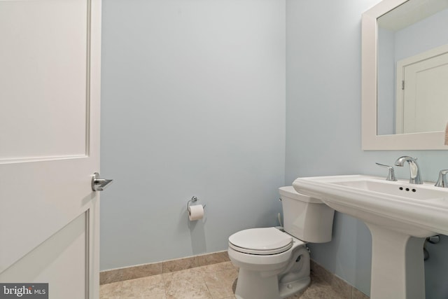 bathroom featuring toilet