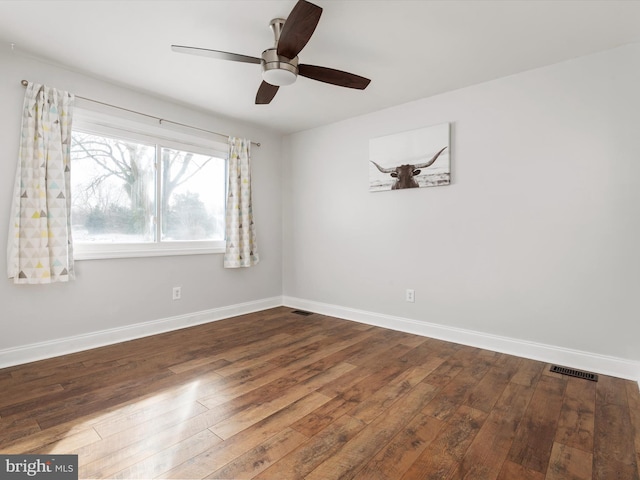 unfurnished room featuring ceiling fan and wood-type flooring