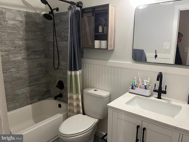 full bathroom featuring vanity, toilet, and shower / bathtub combination with curtain