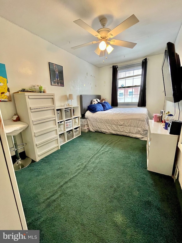 carpeted bedroom with ceiling fan