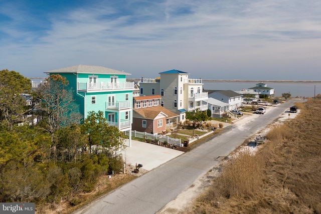 drone / aerial view with a water view