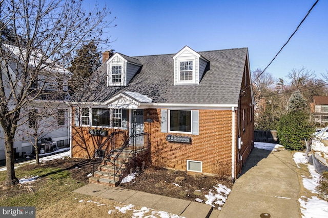 view of new england style home