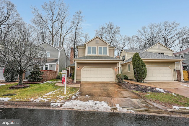 view of front of property with a garage