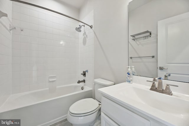 full bathroom featuring toilet, vanity, and bathing tub / shower combination