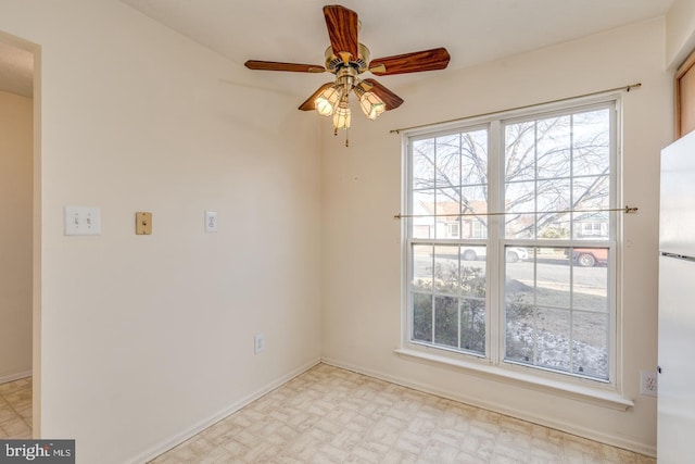 empty room featuring ceiling fan