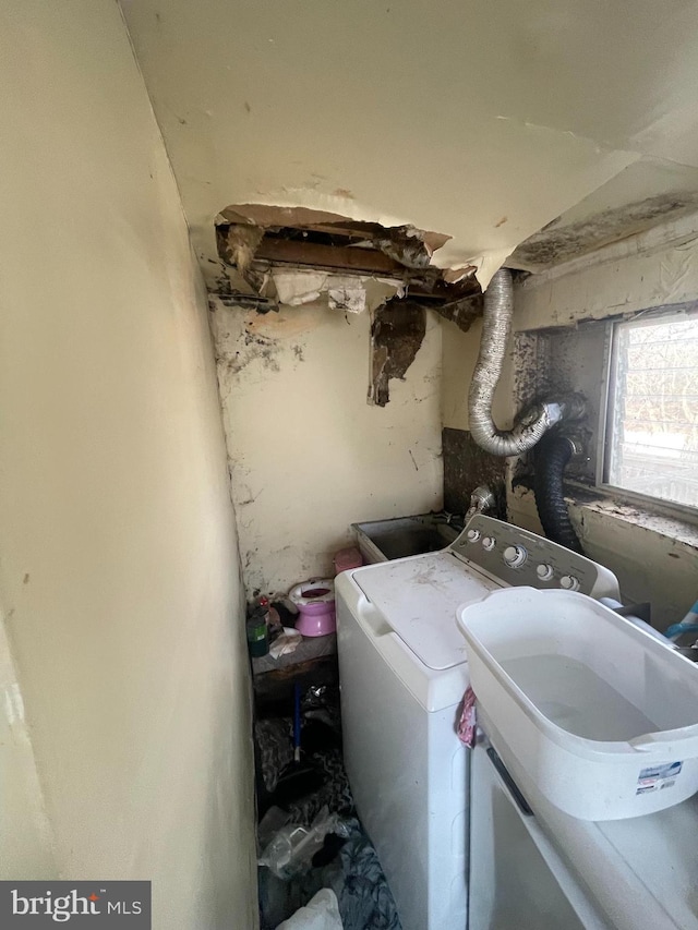 laundry area with sink and washer / clothes dryer