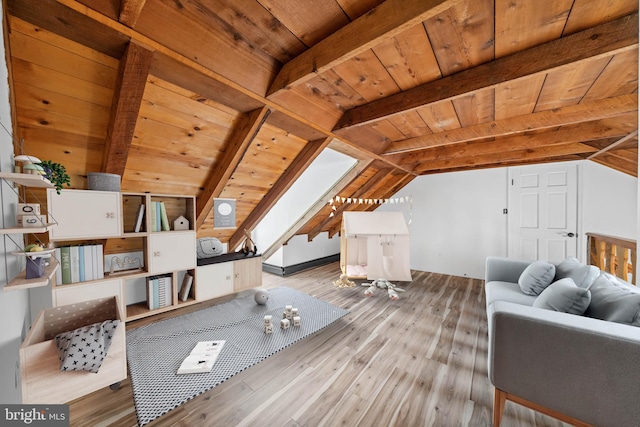 living room featuring vaulted ceiling with beams, wood ceiling, and light hardwood / wood-style floors