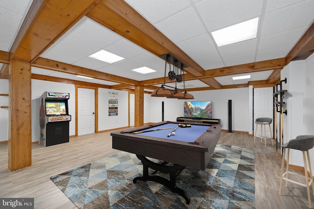 playroom with a paneled ceiling, light hardwood / wood-style flooring, and pool table