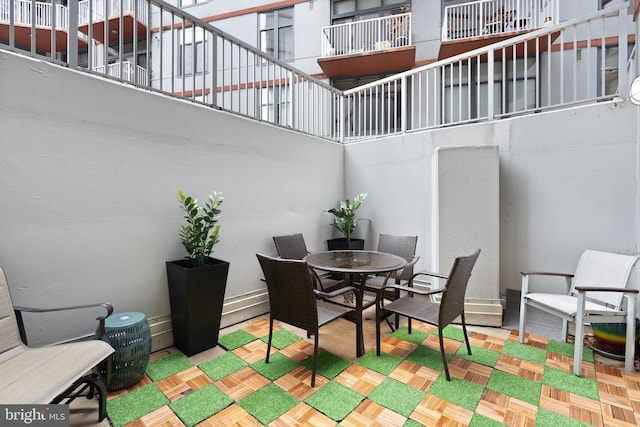 view of patio with a baseboard heating unit