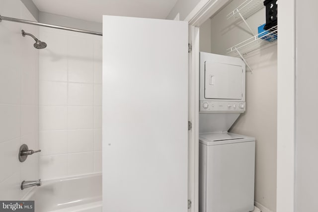 laundry room with stacked washer and dryer