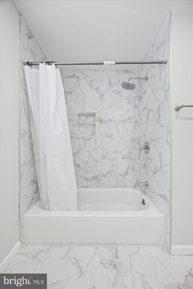 bathroom with shower / tub combo with curtain