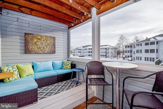 wooden deck featuring an outdoor hangout area