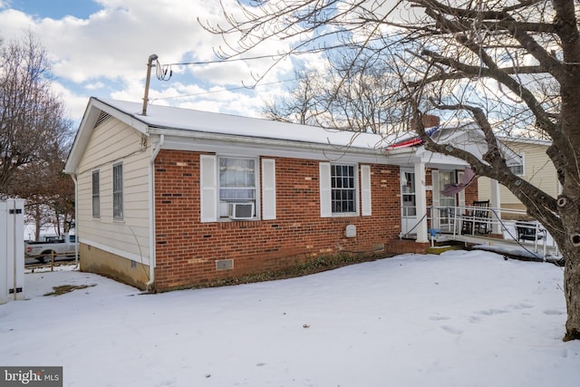 view of front of property with cooling unit