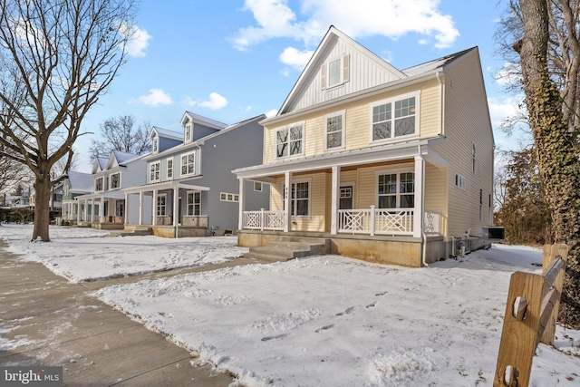 view of front of property featuring covered porch and central air condition unit