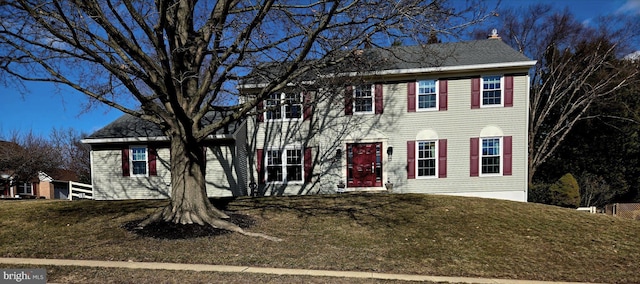 colonial house with a front lawn