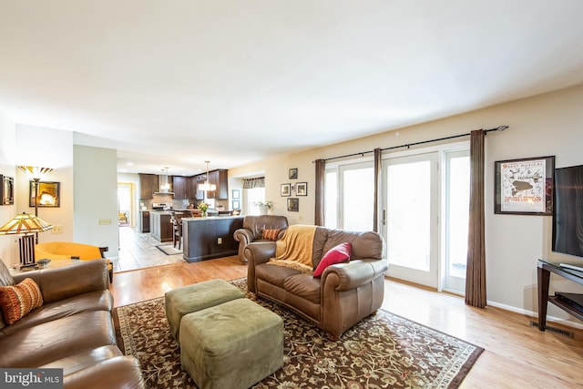 living room featuring light wood-type flooring