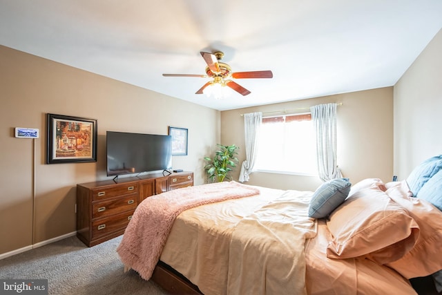 bedroom featuring ceiling fan, lofted ceiling, and carpet flooring