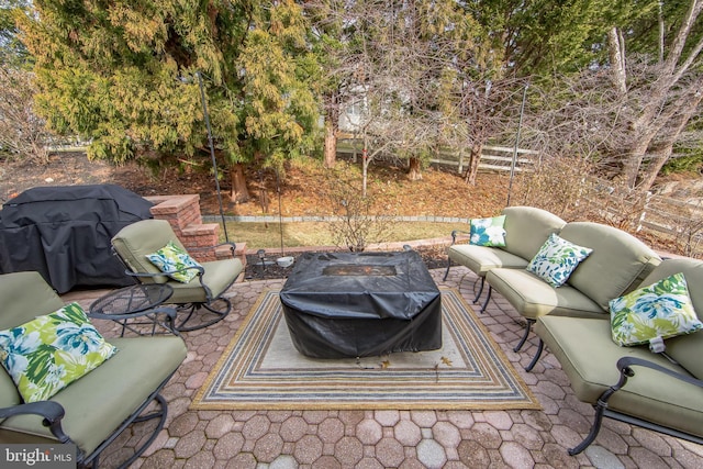 view of patio featuring area for grilling and outdoor lounge area