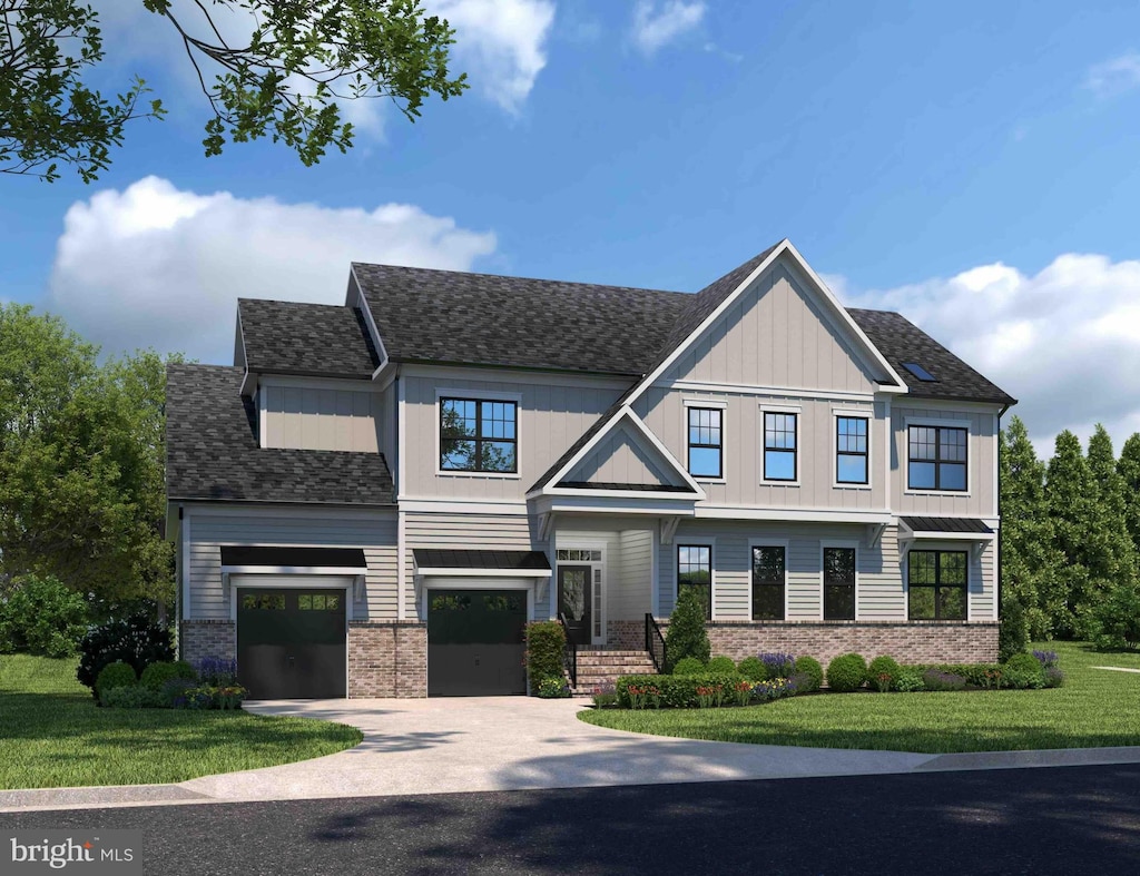 view of front of home featuring a garage and a front lawn