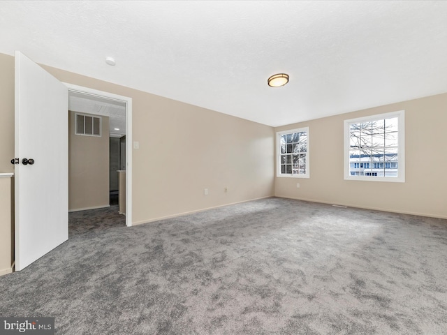 unfurnished room with carpet