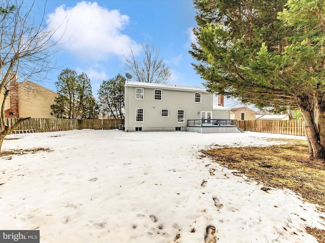 view of snow covered house