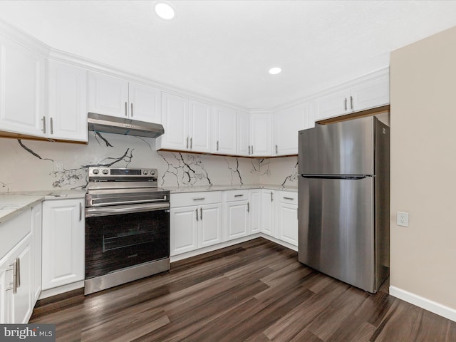 kitchen featuring decorative backsplash, appliances with stainless steel finishes, light stone counters, dark wood-type flooring, and white cabinetry