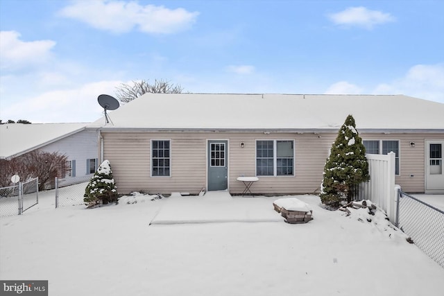 view of snow covered house