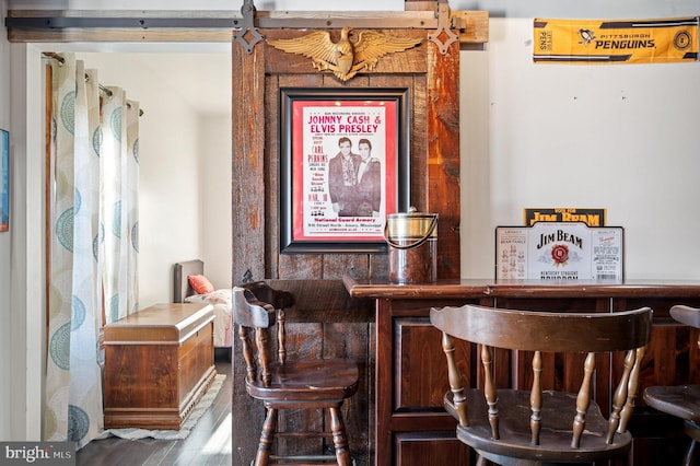 bar with dark brown cabinets