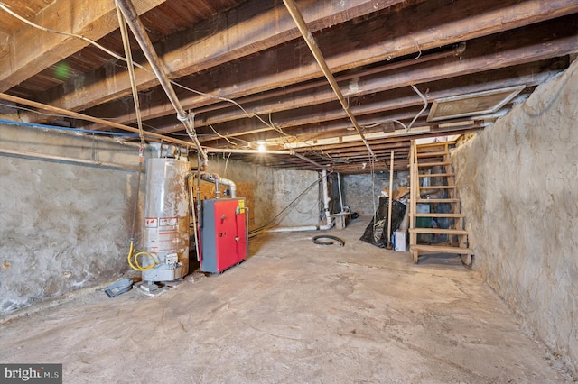 unfinished below grade area featuring water heater and a heating unit