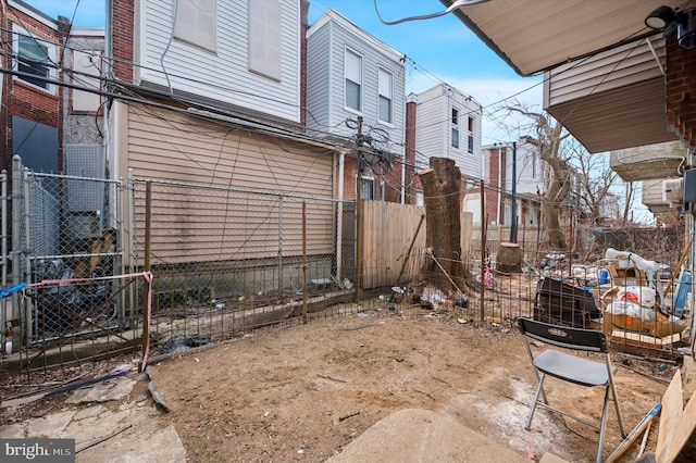 view of property exterior featuring fence