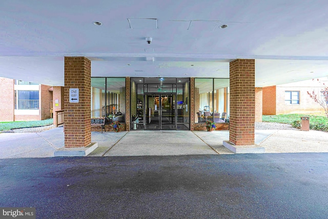 view of exterior entry featuring french doors