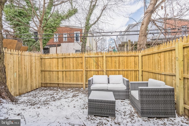 view of snow covered patio