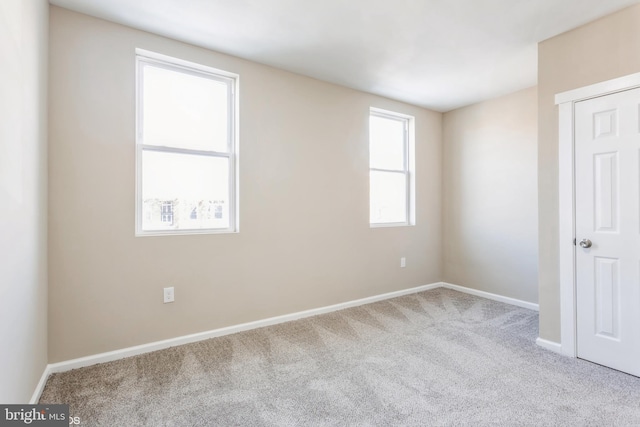 spare room with carpet flooring