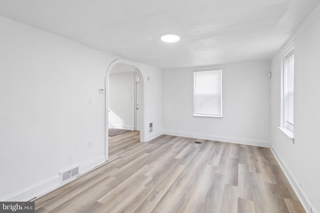 unfurnished room featuring light hardwood / wood-style flooring