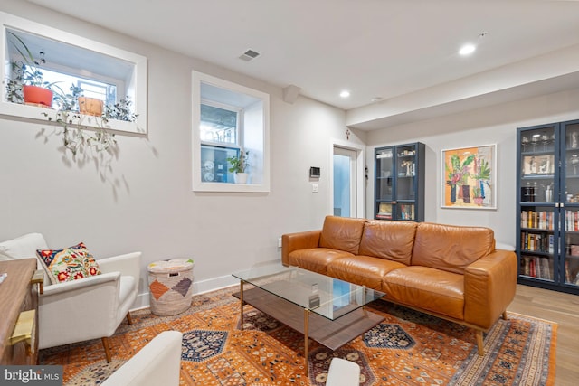 living room with light hardwood / wood-style floors