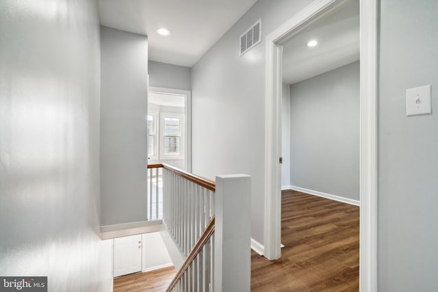 hall featuring wood-type flooring