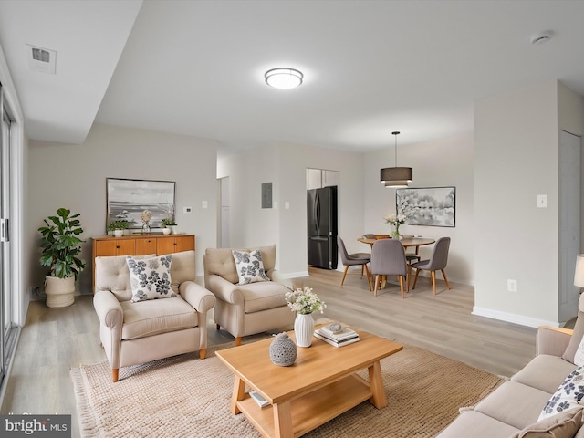 living room featuring light hardwood / wood-style floors