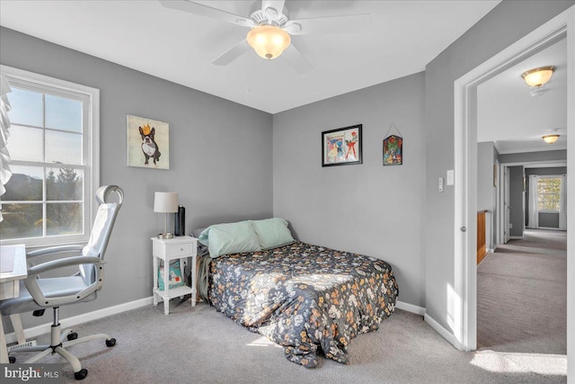 bedroom featuring carpet flooring and ceiling fan